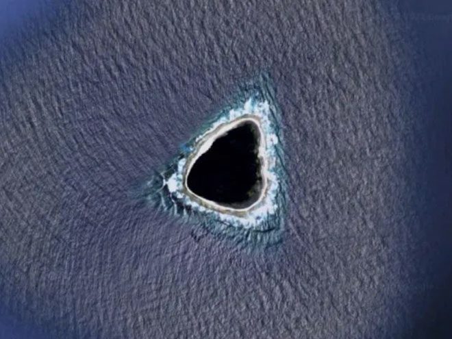 The island on Google Maps looks like a black hole when viewed from above.
