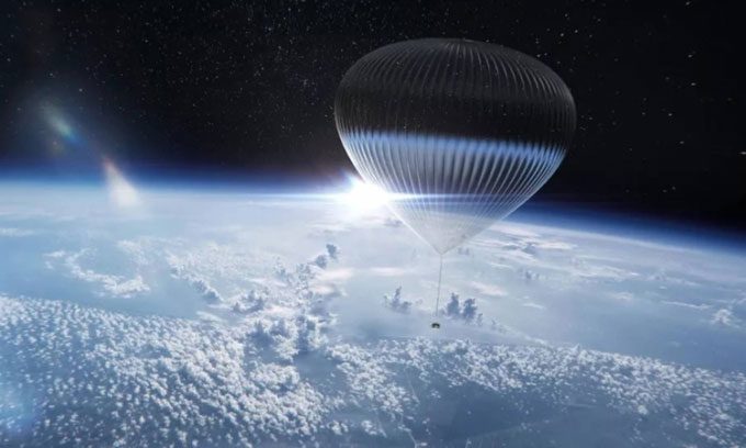 Balloon carrying passenger capsule to the stratosphere.