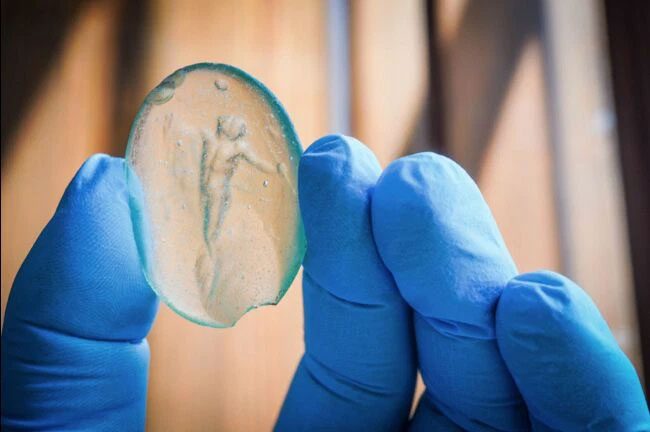 A piece of glass believed to be engraved with the image of the god Dionysus
