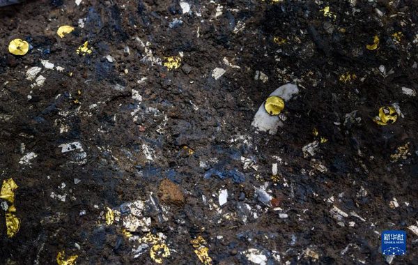 Pieces of gold dust found in excavation area of Pit No. 5