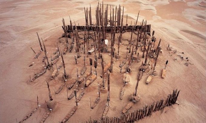 Hundreds of mummies scattered across boat graves in the Tarim Basin desert.