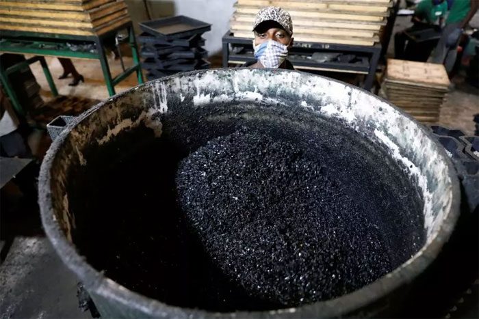 The process of recycling used car tires.