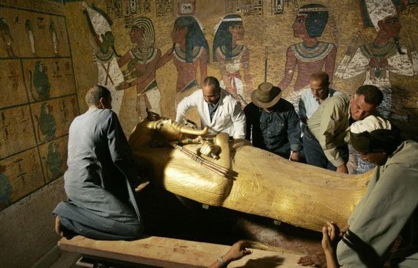 Image of opening King Tutankhamun's sarcophagus in the tomb in the Valley of the Kings on November 4, 2007