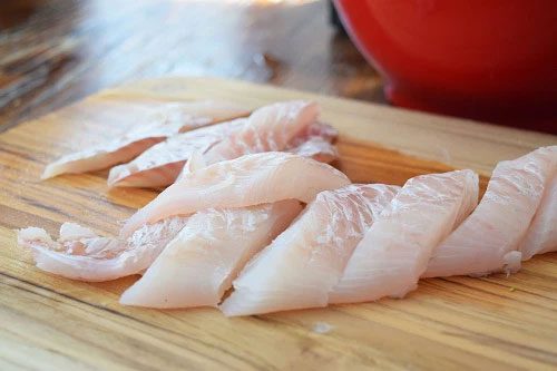 For snakehead fish, use scissors to cut the backbone.