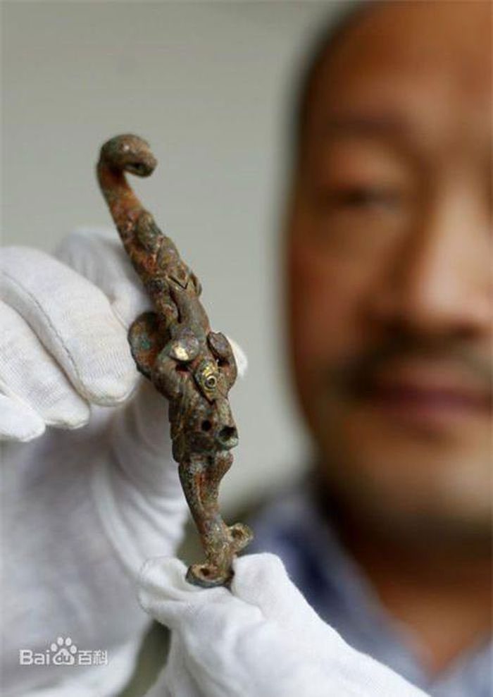Bronze belt hook.