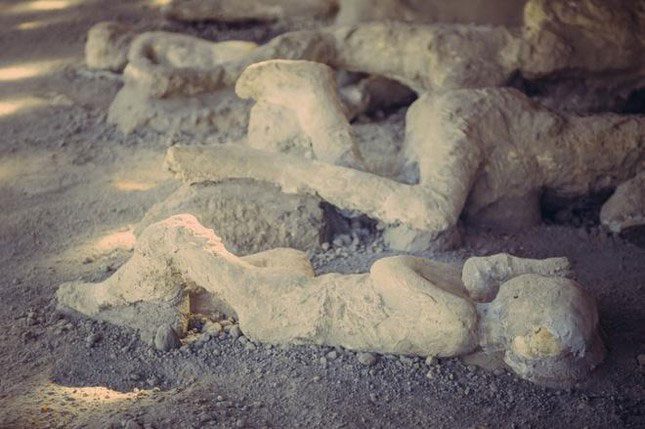 Plaster casts depicting victims who died while sheltering during the eruption of Mount Vesuvius