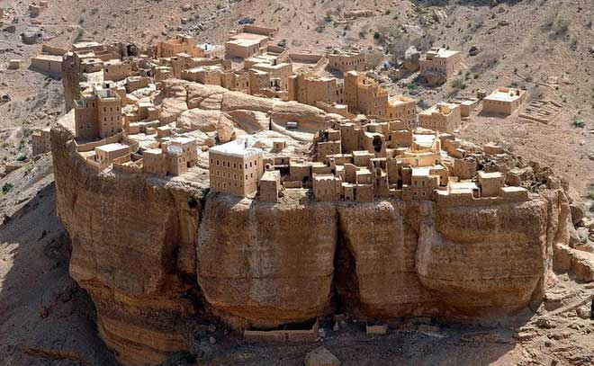 The village perched on a large rock in Yemen.