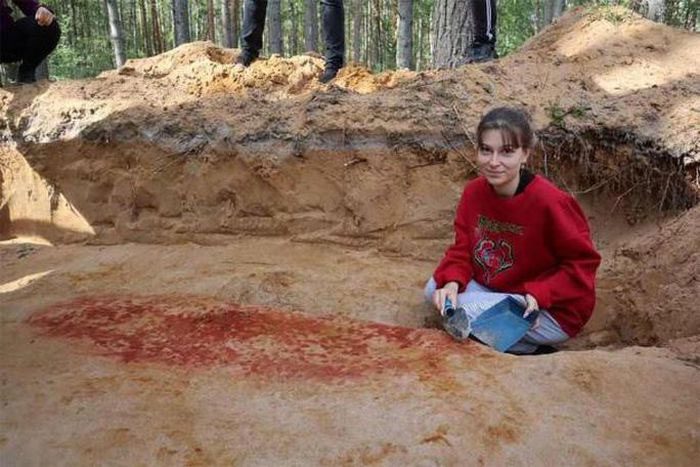 A scientist at the site of the "treasure tomb"
