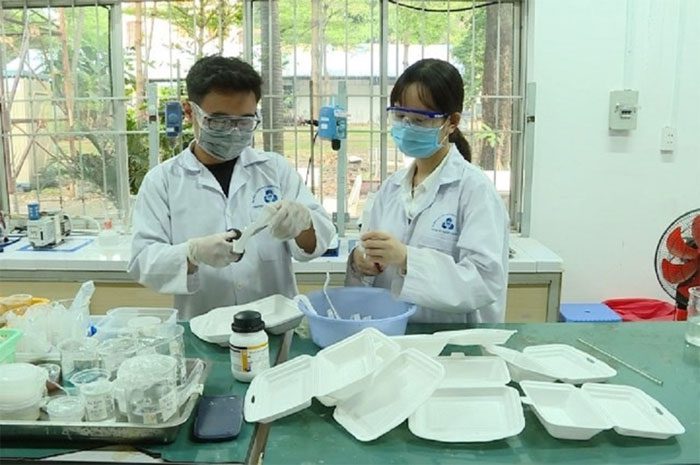 The group used discarded food containers to make bricks.