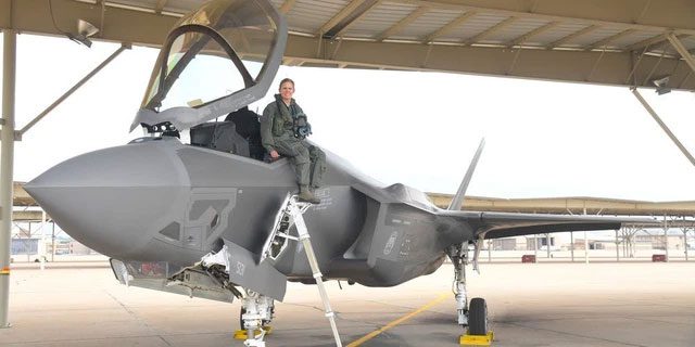 A female fighter pilot in an F-35A.