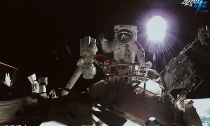 Shenzhou 13 astronauts perform their first spacewalk.