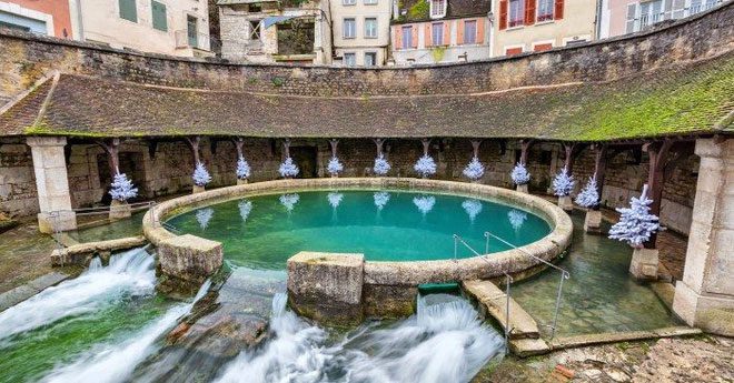 Fosse Dionne is a circular stone pool built in the 18th century.