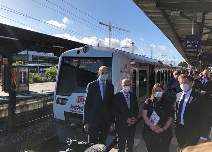 Officials attend the launch of the driverless train in Hamburg.