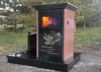 this is the first headstone to set up a tv to show videos of the deceased 117829