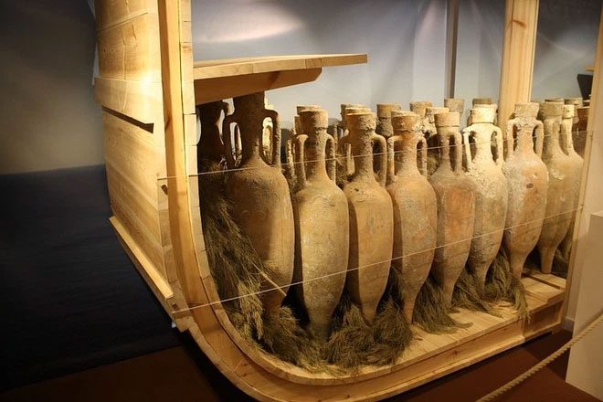 Ancient wine transport ship model in the Mediterranean.