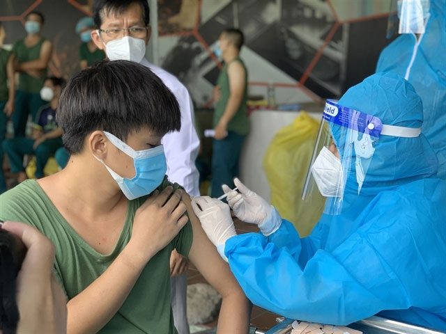 Administering Covid-19 vaccines to frontline workers in Thu Duc City, Ho Chi Minh City