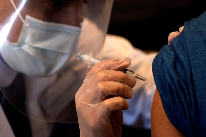 Healthcare workers administering the Johnson & Johnson vaccine in the US in April.