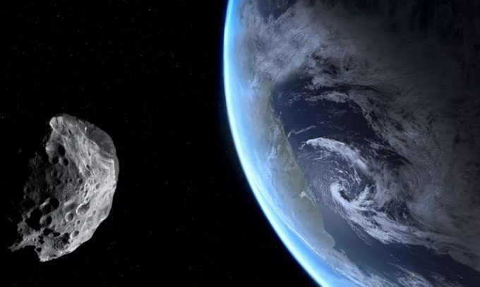 Simulation of an asteroid flying near Earth.