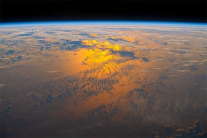 This is a photo of the sunset over the ocean taken on June 15.