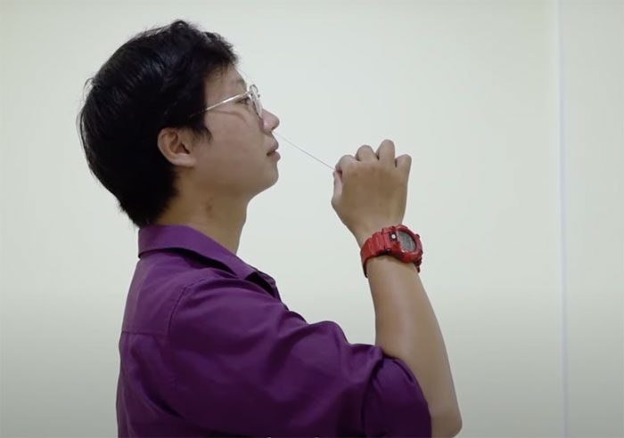 Using a rapid test to detect SARS-CoV-2 antigens.