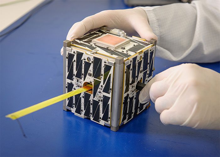 A CubeSat satellite in NASA's laboratory.