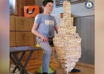 video 12 year old boy sets record balancing 1 400 wood blocks 116745