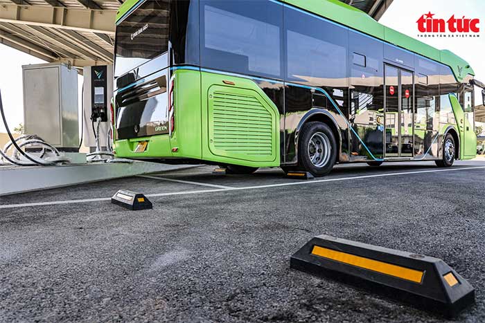 Smart electric bus primarily in green color