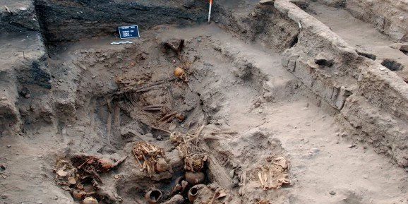 The tomb with scattered skeletons.